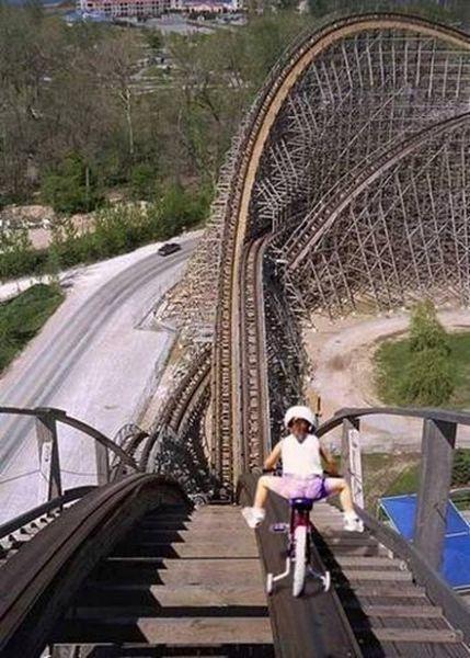Going down a roller-coaster on a bike with training wheels