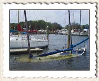 Sailboat sunk at dock